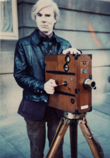 Andy Warhol with film camera, 1960 foto ricevuta da  Irma Bianchi Comunicazione in occasione dell'invio del comunicato stampa ANDY WARHOL. THE BOMB evento tenutosi nel novembre 2006 a Padova alla Vecchiato New Art Galleries